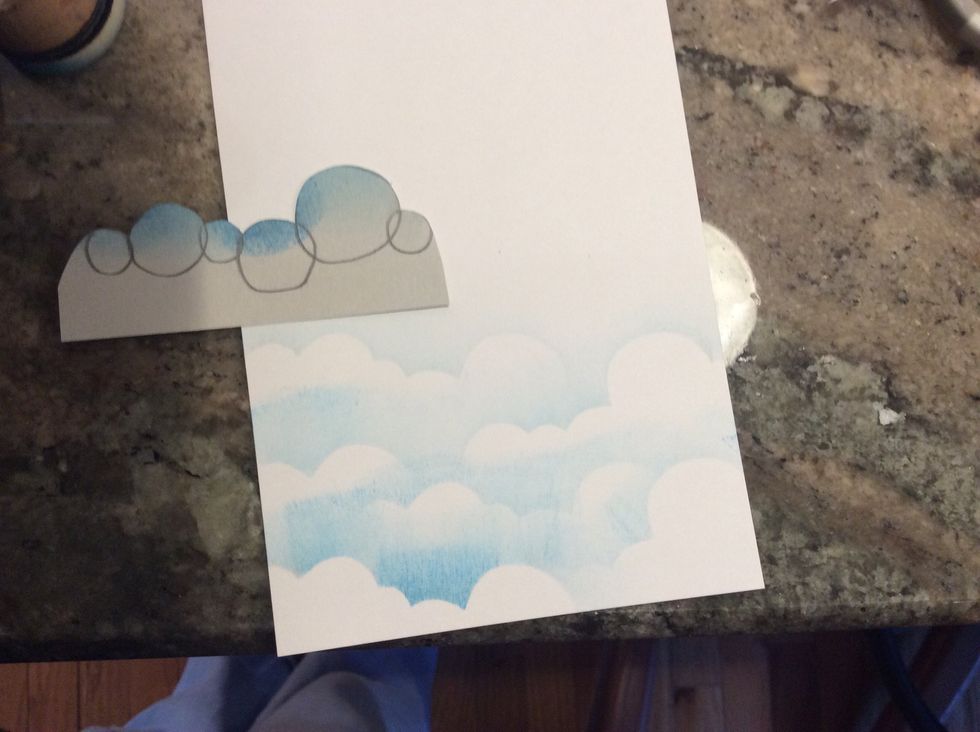 Continue to move and turn your stencil as you go up the paper.