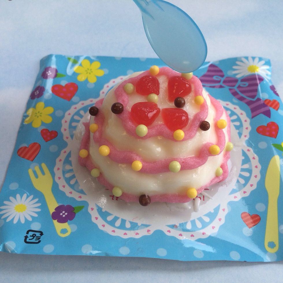 Continue to place berries on cake