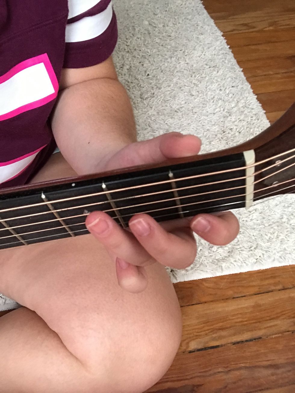Continue to practice this chord, and when you are comfortable with it, begin to move your left hand fingers while continuing to strum.