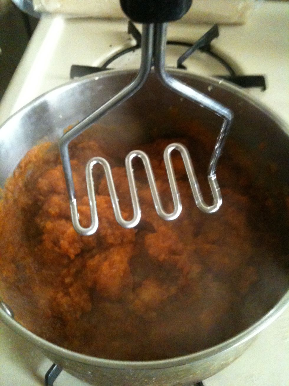 Continue to simmer pumpkin mixture until thick & shiny, 10 to 15 min while smashing the yam
