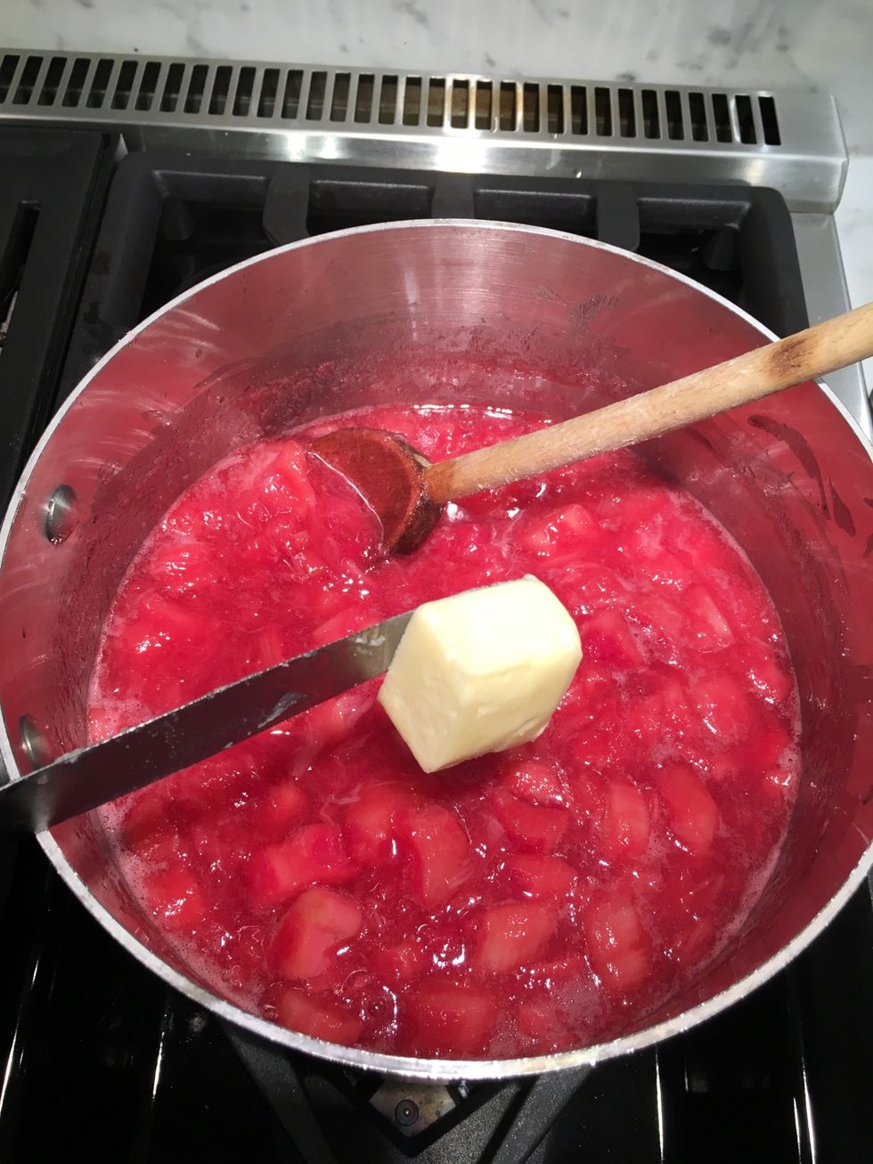 Continue to stir and add 1 heaping tablespoon of butter. By heaping, I mean more if you like. But not less.