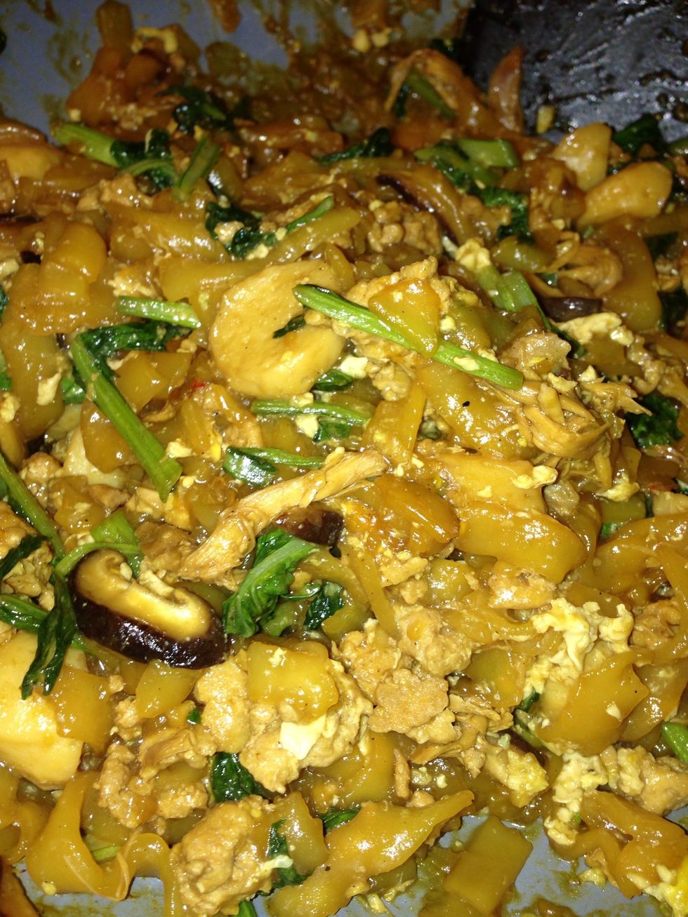 Continue to stir-fry and make sure the egg is cooked through. Add green onion, do a couple of quick stirs, dish out and serve immediately. If you want, you could also add some chili paste now.