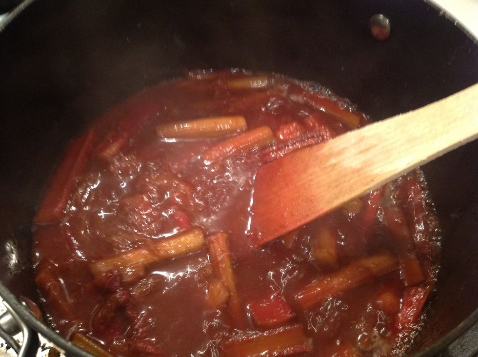 Continue to stir the rhubarb to help the pieces break down.