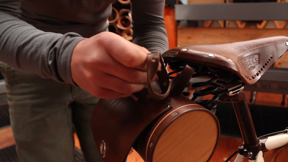 Continue to weave into the bag through the 2nd bag slot.