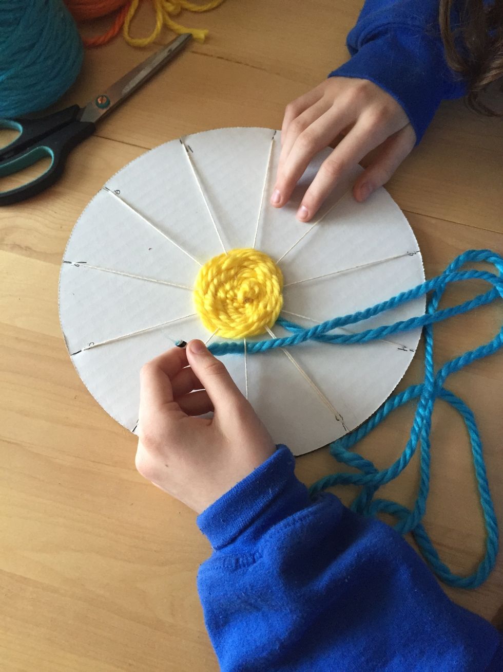 Continue to weave with "fake shoelace" end just like you did with your first color.