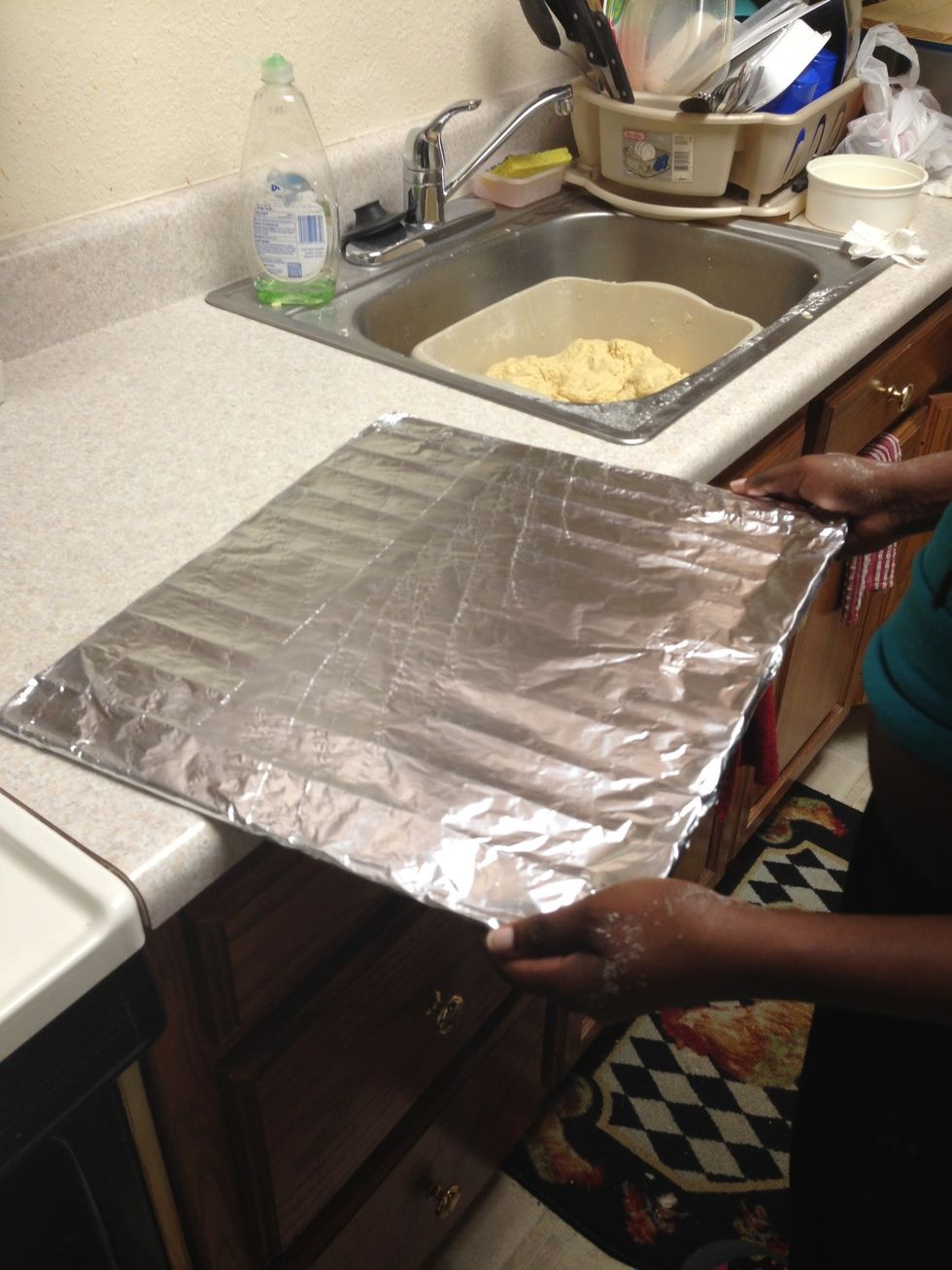 Continue to Wrap foil all around oven metal bar