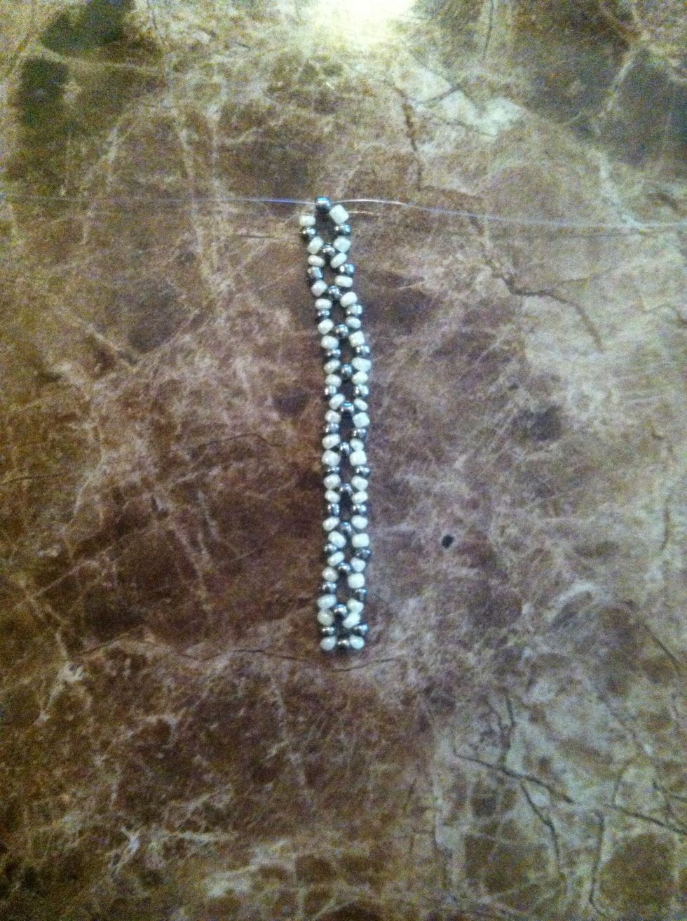 Continue until it wraps tightly along the finger it would be worn on and then create 1 extra circle