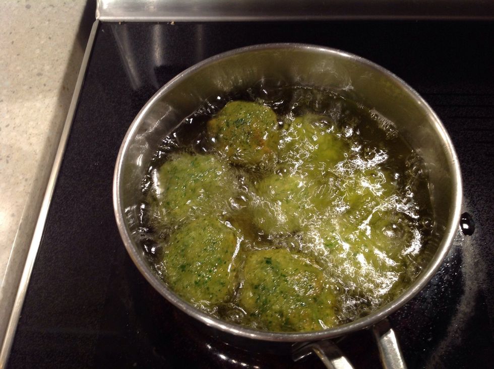 Continue until they are done - but don't put crowd the pan like I did here. It dropped the temperature of the oil, and some of the falafels fell apart.