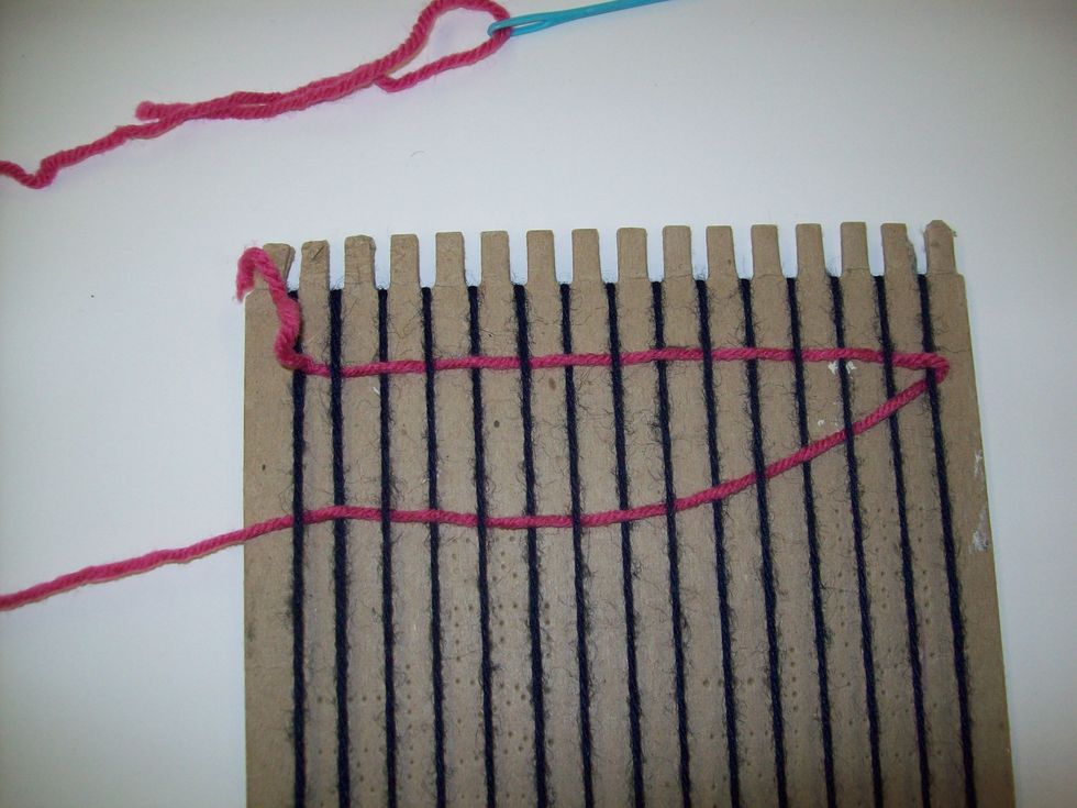 Continue weaving the weft following the OVER/UNDER pattern.