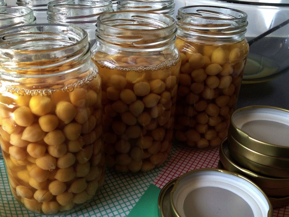 Continue with remaining jars. Again, it's important to leave space on top of the beans and cooking liquid. Leave to cool, then place in the fridge with the lids OFF to cool completely overnight.
