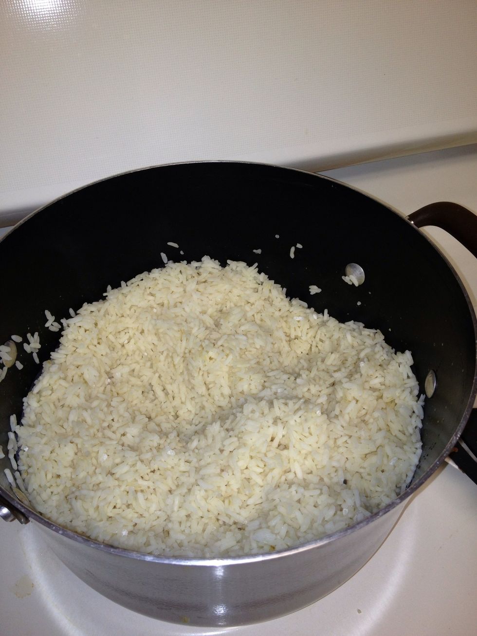 Cook 1 1/2 cups of rice following the instructions on the box. Should yield 3 cups.