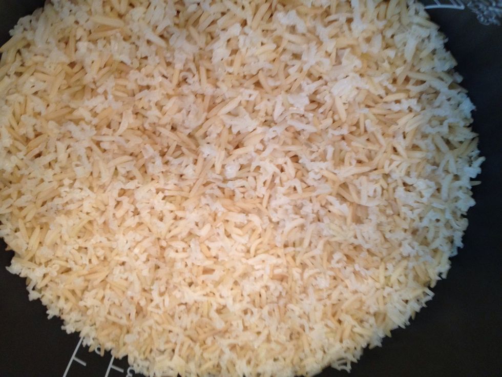 Cook 2 cups of rice in the rice cooker