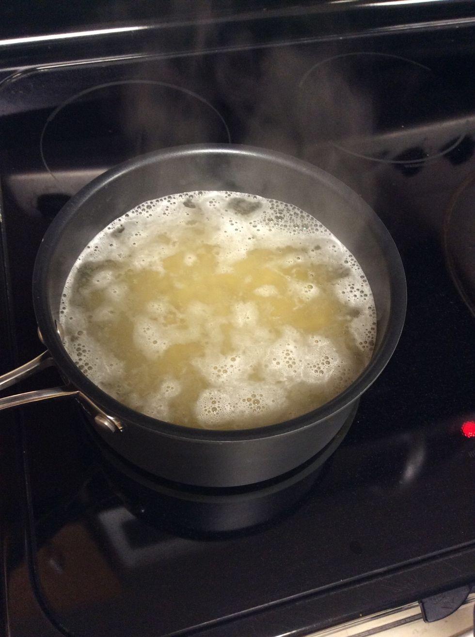 Cook 4 cups of macaroni in the boiling salted water until al dente.