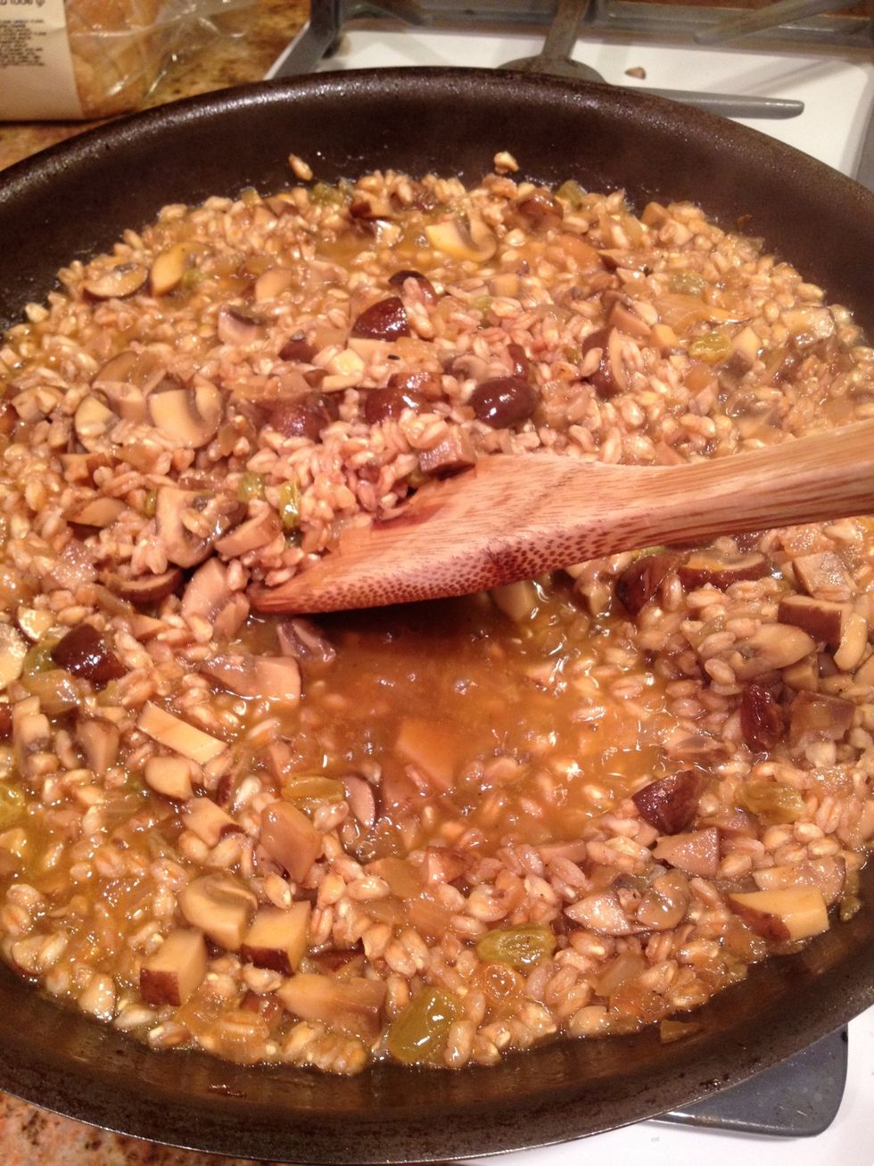 Cook adding vegetable stock and stirring constantly similar to a risotto
