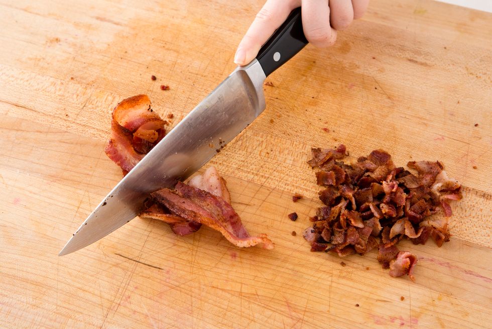 Cook and crumble four strips of bacon.