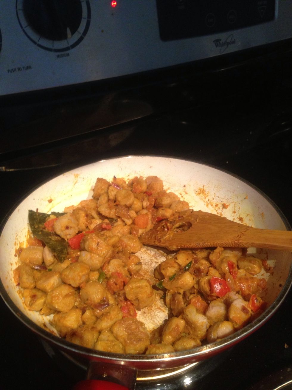 Cook and mix all the spices well with yogurt for 2 more minutes. Time to add the lightly fried soya chunks and cook it with the masala for 2 minutes. After this will add the fried potato cubes as well