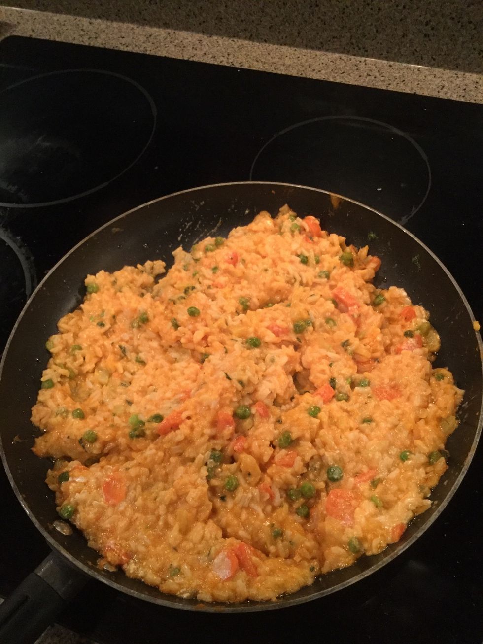 Cook and stir until all vegetables are tender and rice is browned.