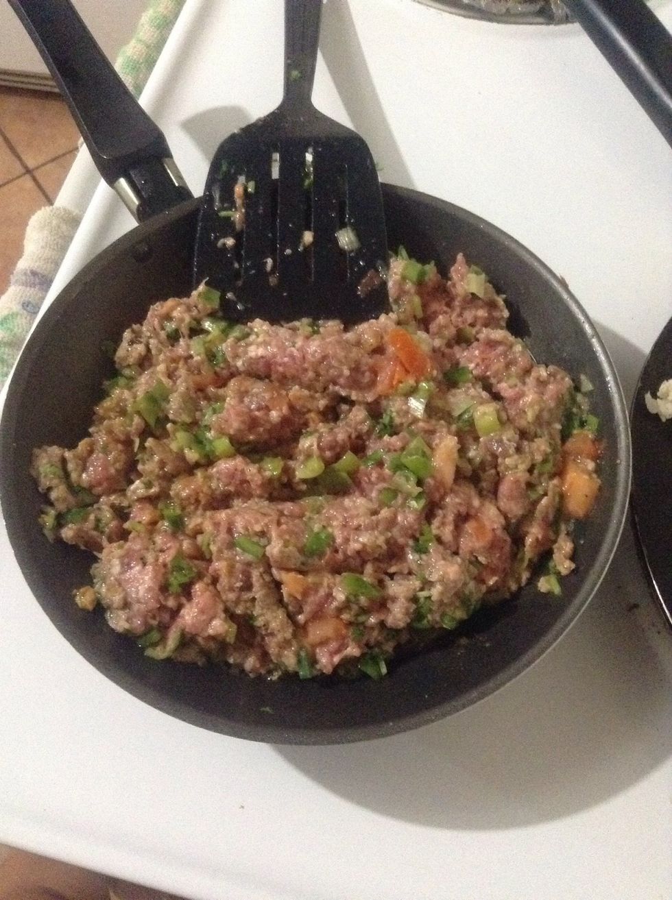 Cook at medium fire, don't stir it up too much so the meat won't cook too lose. Personally, I prefer the meat to cook up in chunks.