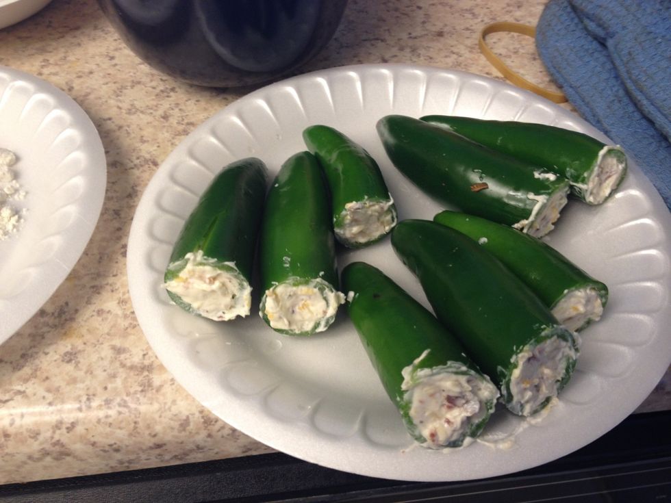 Cook bacon & chop them to the small pieces. Mix cream cheese, mix Mexican, salt, pepper & bacon in the bowl. Cut top of jalape\u00f1o & clean inside with the small knife. Use spoon to stuff mixed.