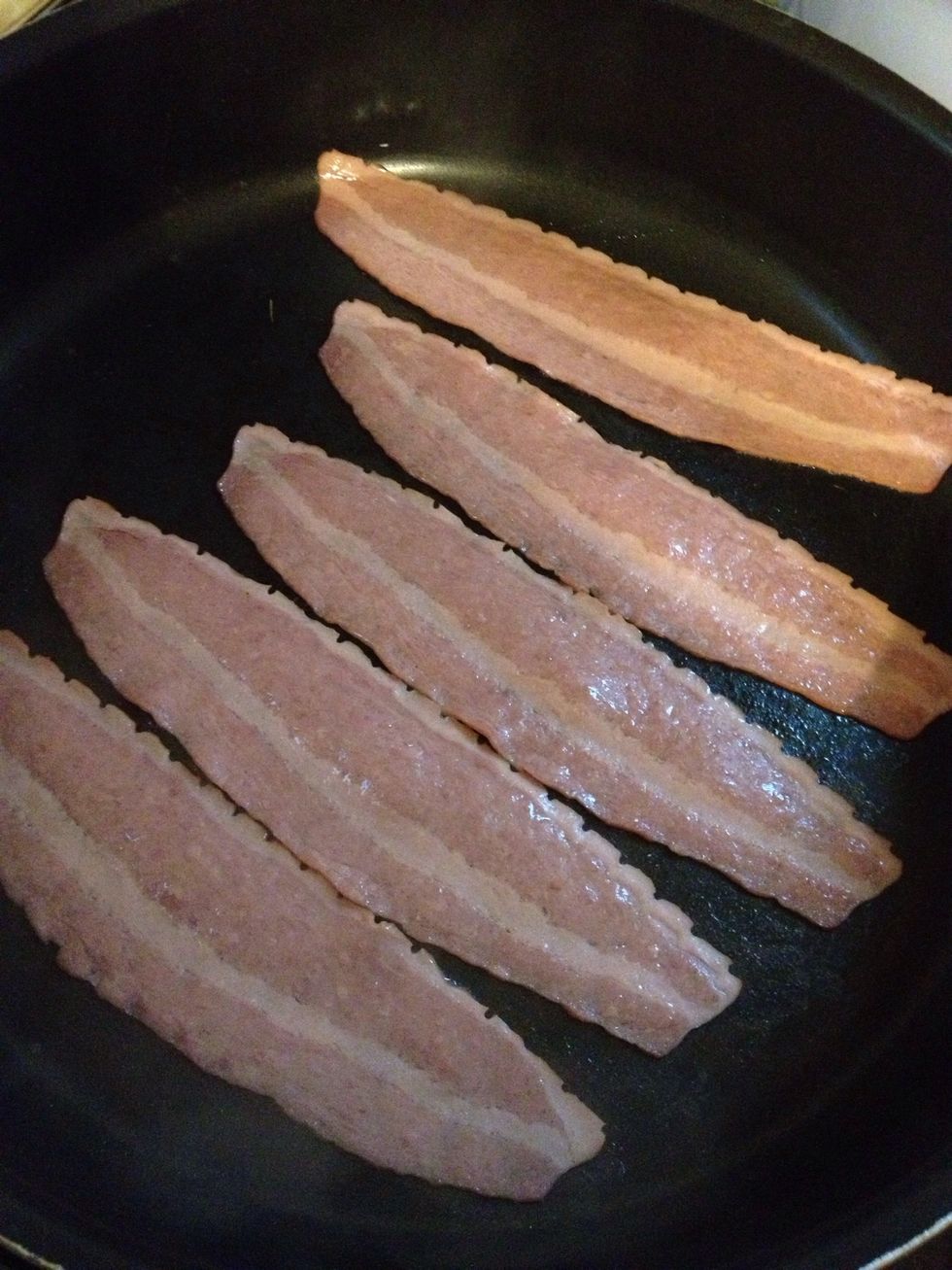 Cook bacon frying pan until crispy