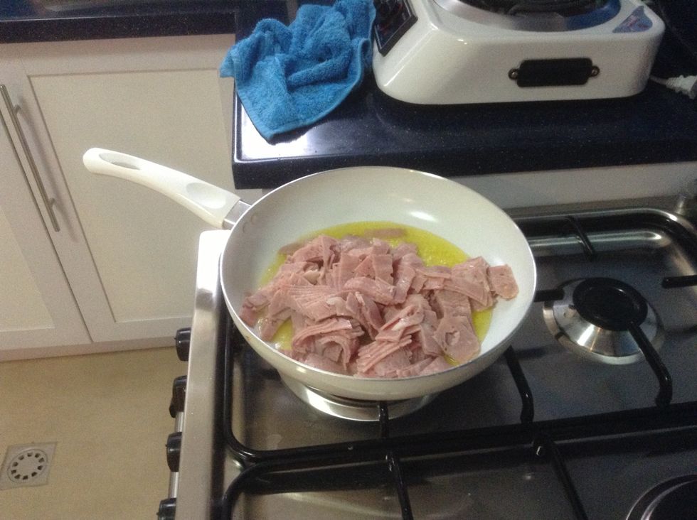 Cook bacon in olive oil