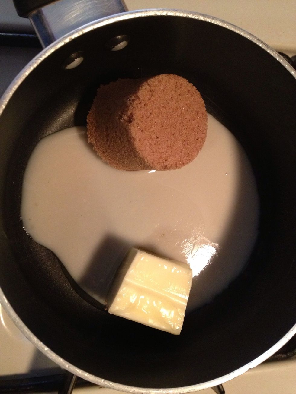 Cook butter, brown sugar and 2 tablespoons milk in saucepan over medium-low heat, stirring constantly, until sugar is melted. Remove from heat.