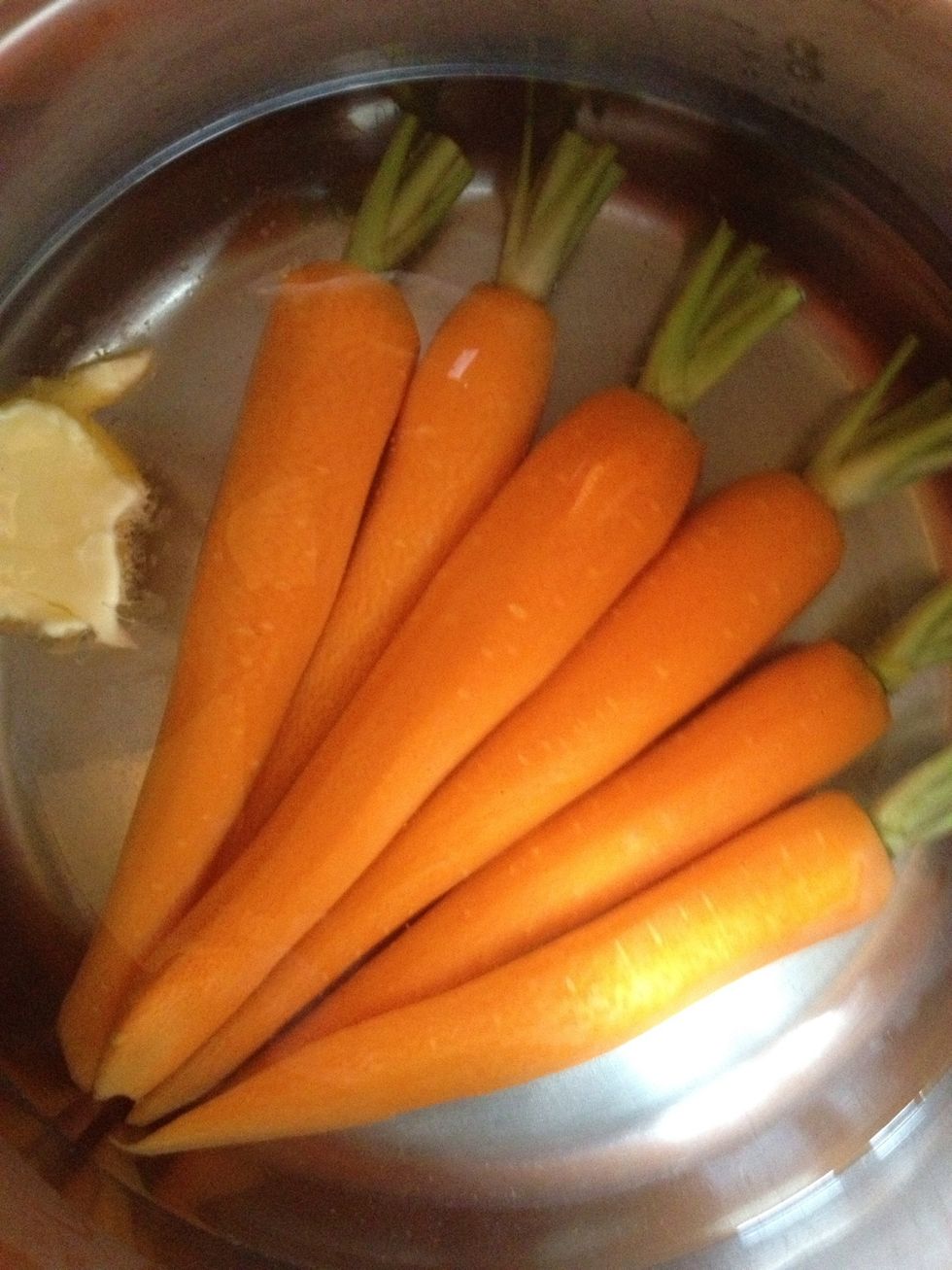 Cook carrots in a small amount of water add salt and 1tbs butter