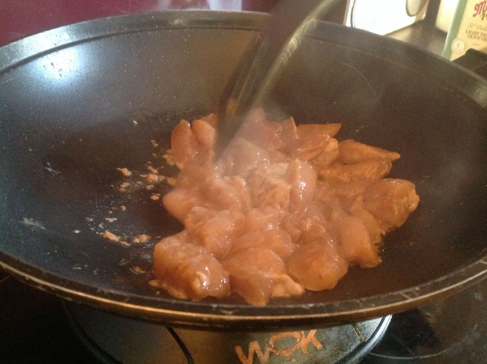 Cook chicken on high in a wok for 5 minutes or until brown. Remove chicken from wok.