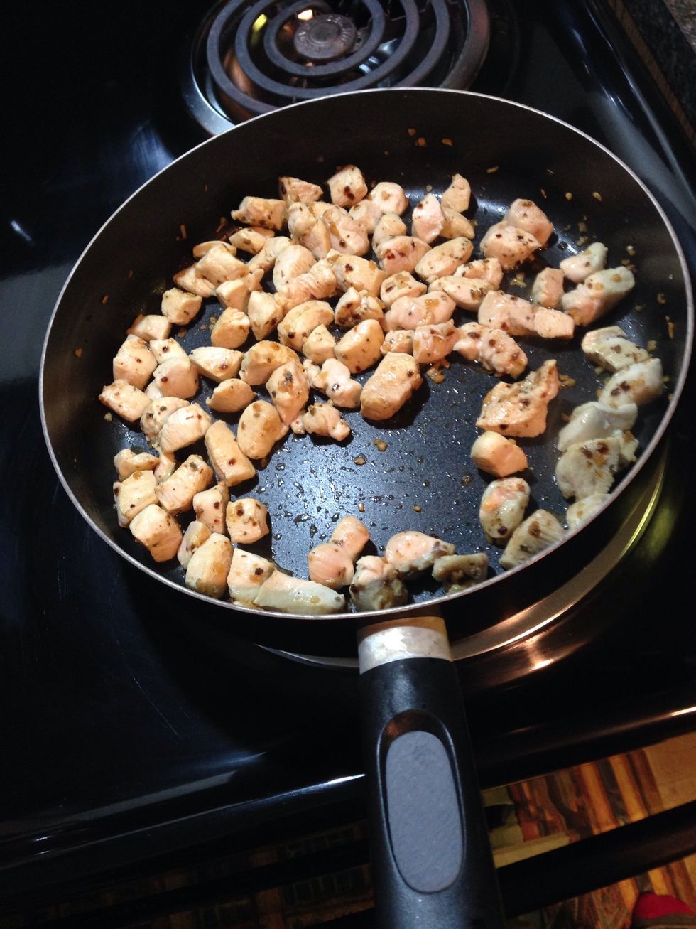 Cook chicken until no longer pink