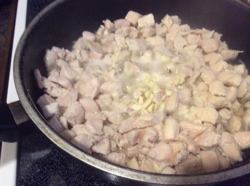Cook chicken with chicken broth & then add garlic