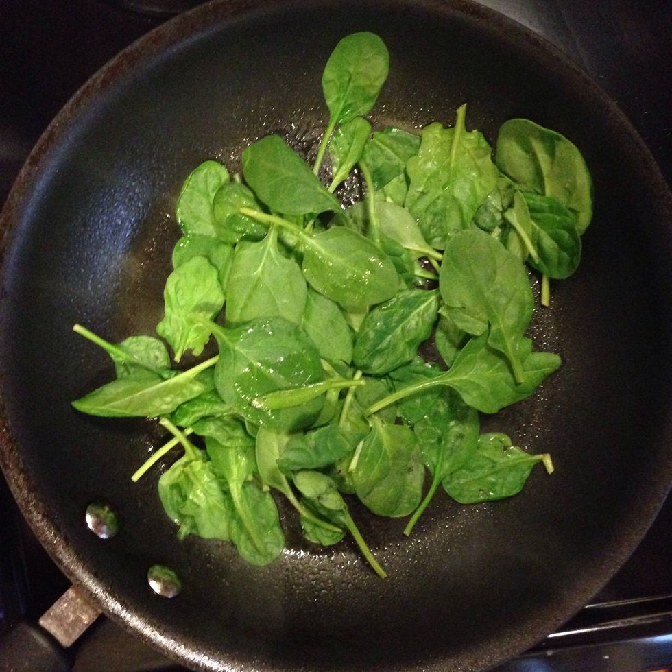 Cook down spinach in a medium heat pan using Pam cooking spray