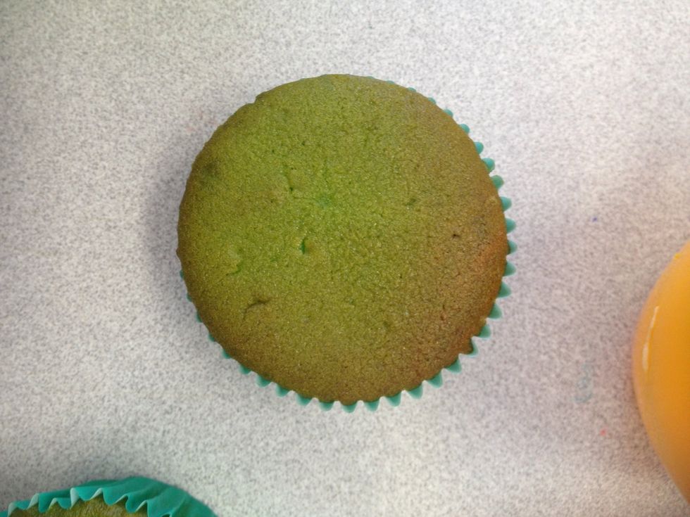 Cook each cup cake with green in middle
