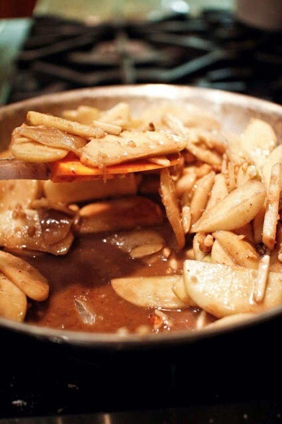 Cook everything down until the apples are lightly caramelized and softened. They should be cooked but still have a bit of firmness.