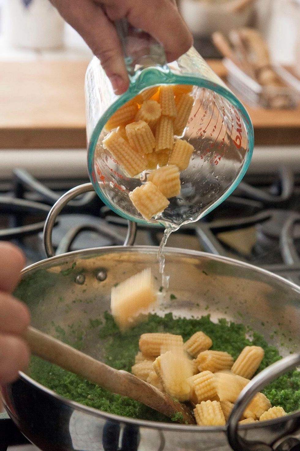 Cook everything for about 5 minutes. Add in the baby corn, and 2 Tbs of water.