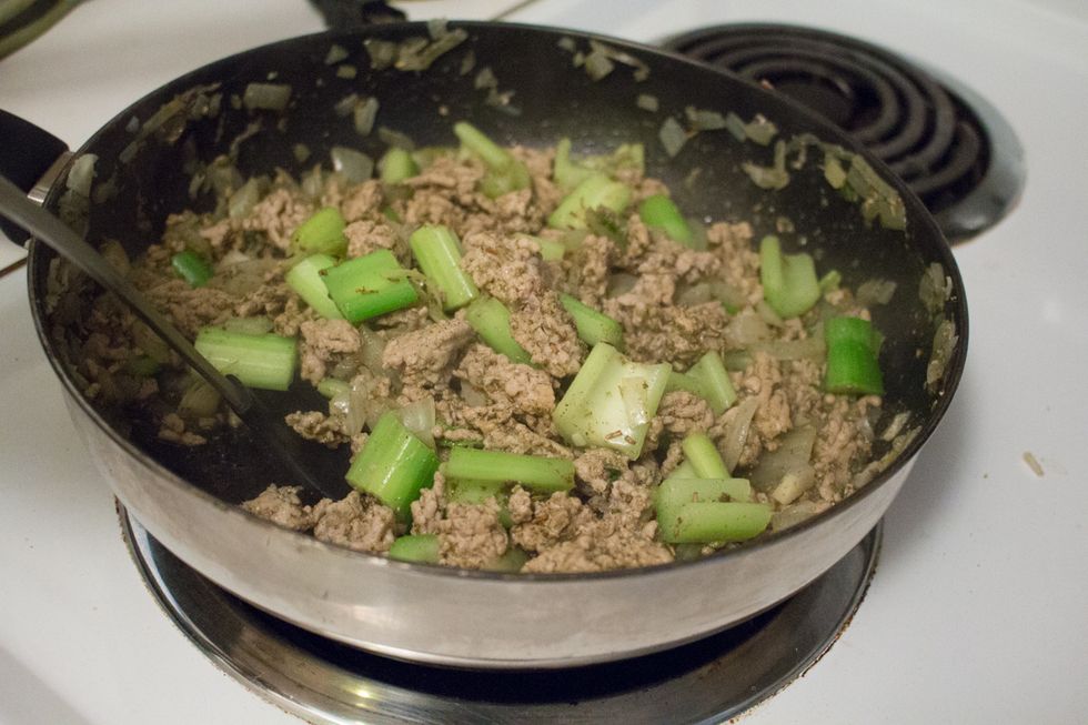 Cook for 2 minutes to allow flavour to blend, mixing with tongs as you go.