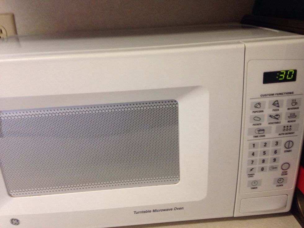 "Cook" for 30-45 seconds. You want the evaporated water to loosen the food and heat you wash cloth or sponge up. The food will just wipe off.