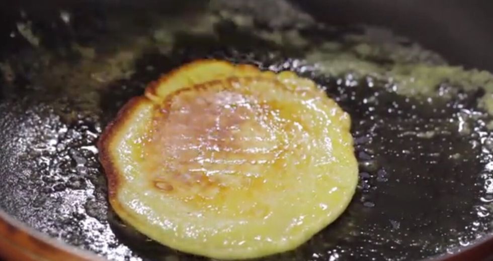 Cook for about two minutes or until the pancake is golden. When you start to see bubbles form and then pop around the edges of the pancake, flip it over with a spatula.