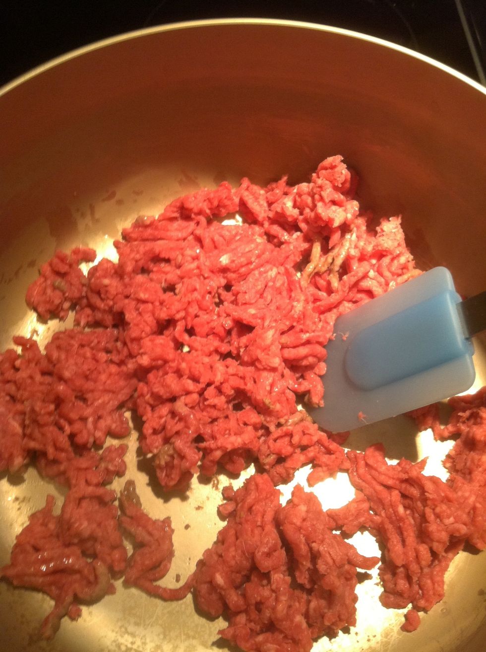 Cook ground beef in large pot, salt and pepper to taste. Make sure you remove the grease.