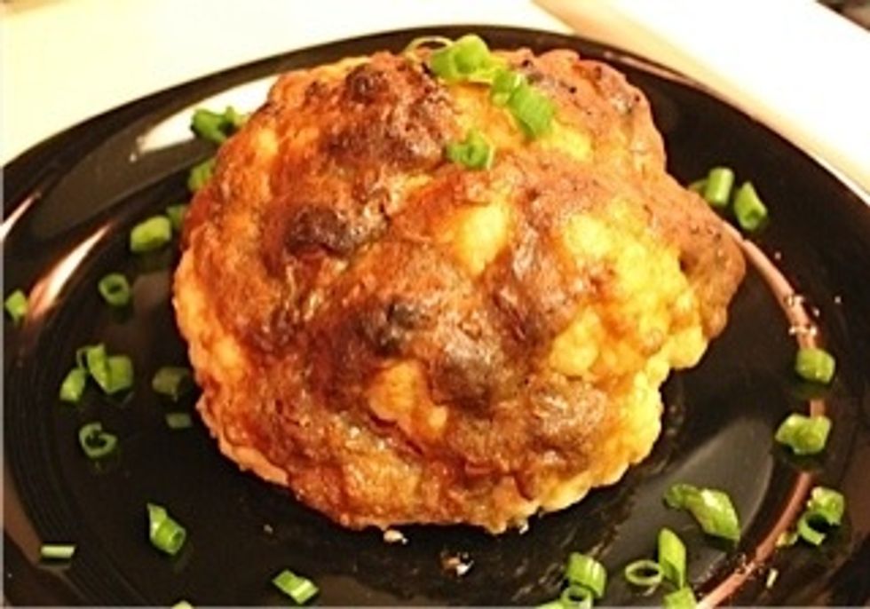 Cook in the oven for about 25 mins or until it browns and crisps. You may garnish with chives.