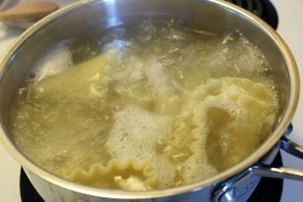 Cook lasagna noodles as it says on the directions.