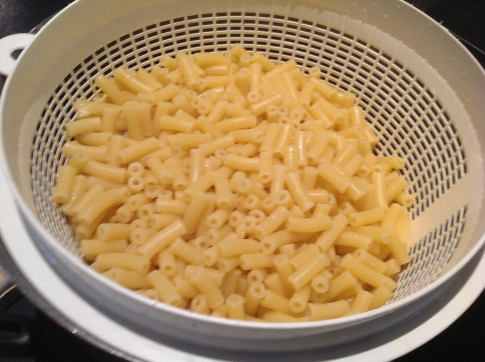 Cook macaroni according to packet instructions, drain and set aside