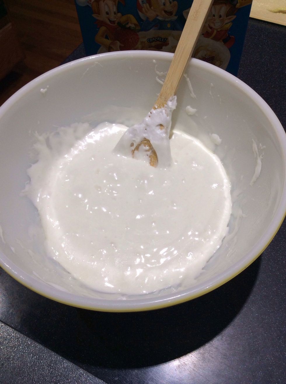 Cook marshmallows in microwave until they are completely melted and mixture is well blended, stirring occasionally. Then remove from the microwave.