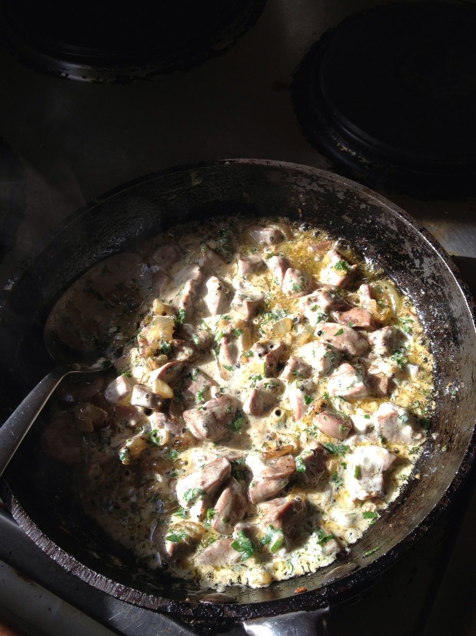 Cook off the cream being careful not to burn it, it will darken but coat everything in a sauce.