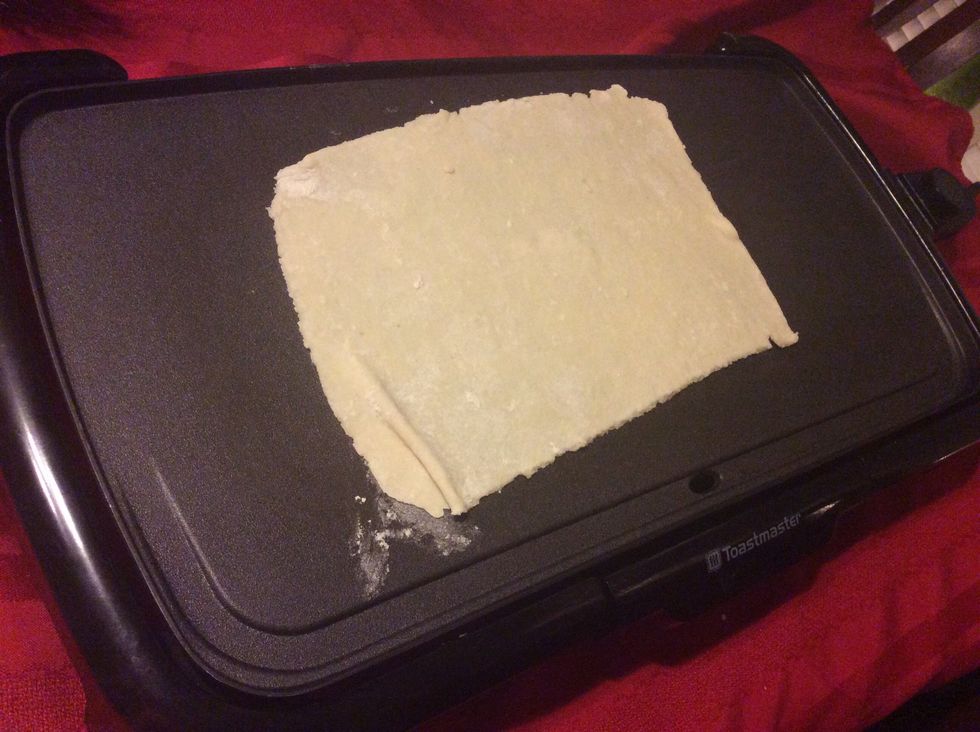 Cook on 350 until lefse begins to bubble. Poke bubbles with the end of lefse stick it is ready to flip when it turns golden brown. Repeat on other side once flipped.