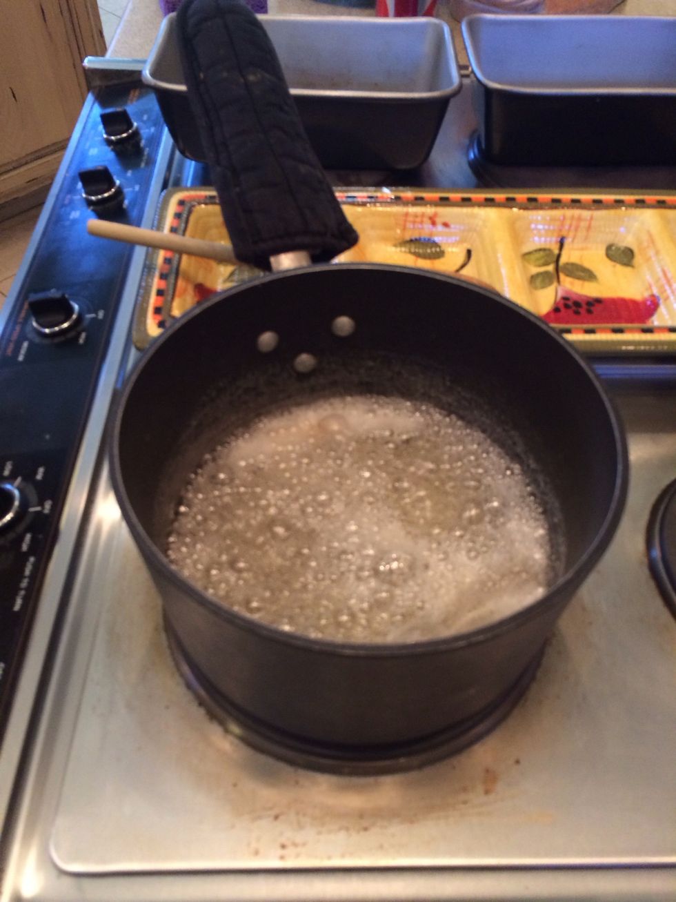 Cook on med-high heat, stirring occasionally until it boils.  G-Ma Nani says it's important to NOT touch after it starts to boil.