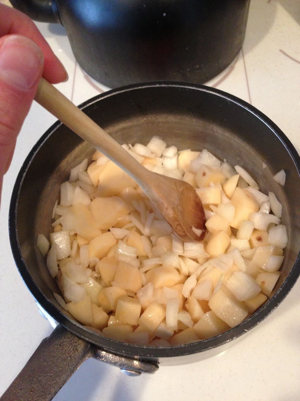 Cook on medium heat, stirring occasionally until the onions are translucent (about 8 minutes)