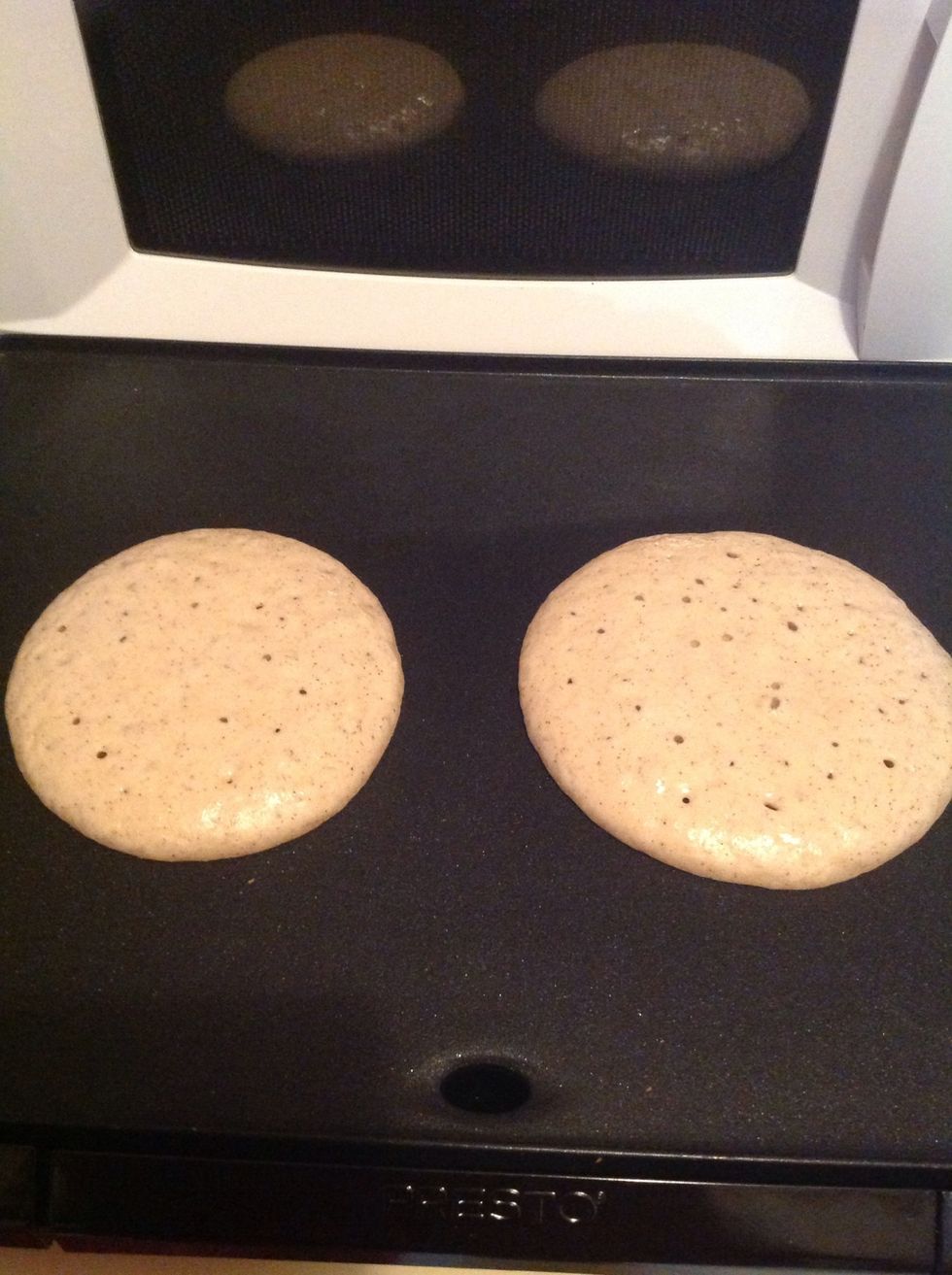 Cook on one side for 2-4 minutes. At this time you should see open air pockets forming in your pancakes. Now it's time to flip!