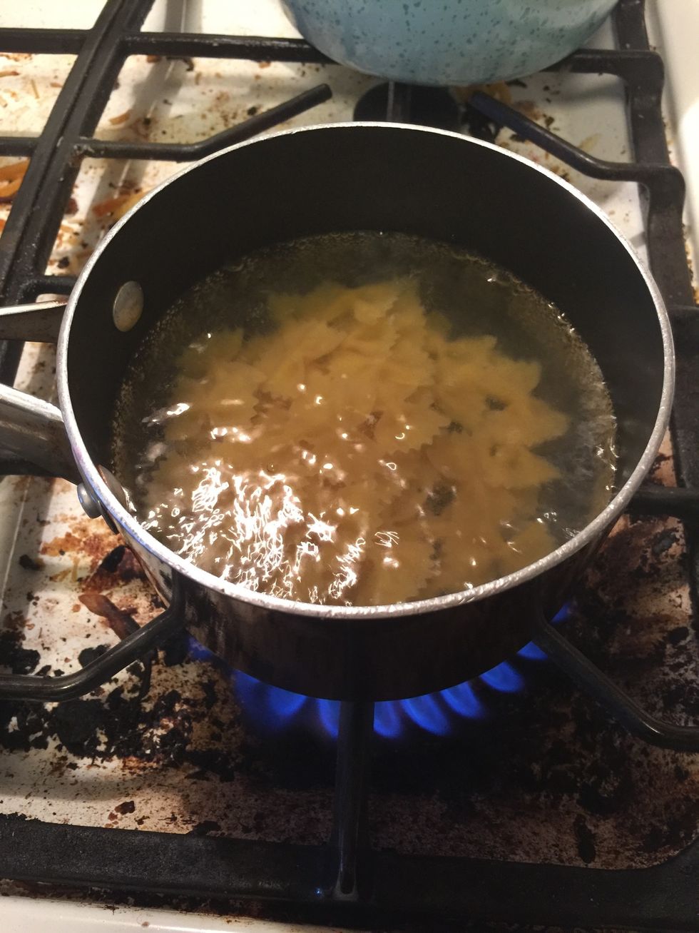 Cook pasta according to directions  I'm using bowtie noodles but really you can use whatever noodles you want to or have