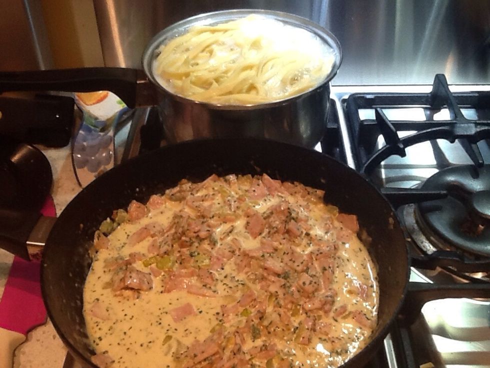 cook pasta for 4 minutes. Add cream, parmesan cheese, parsley,and seasonings. Mix well over low heat for 2 minutes or until warmed through.