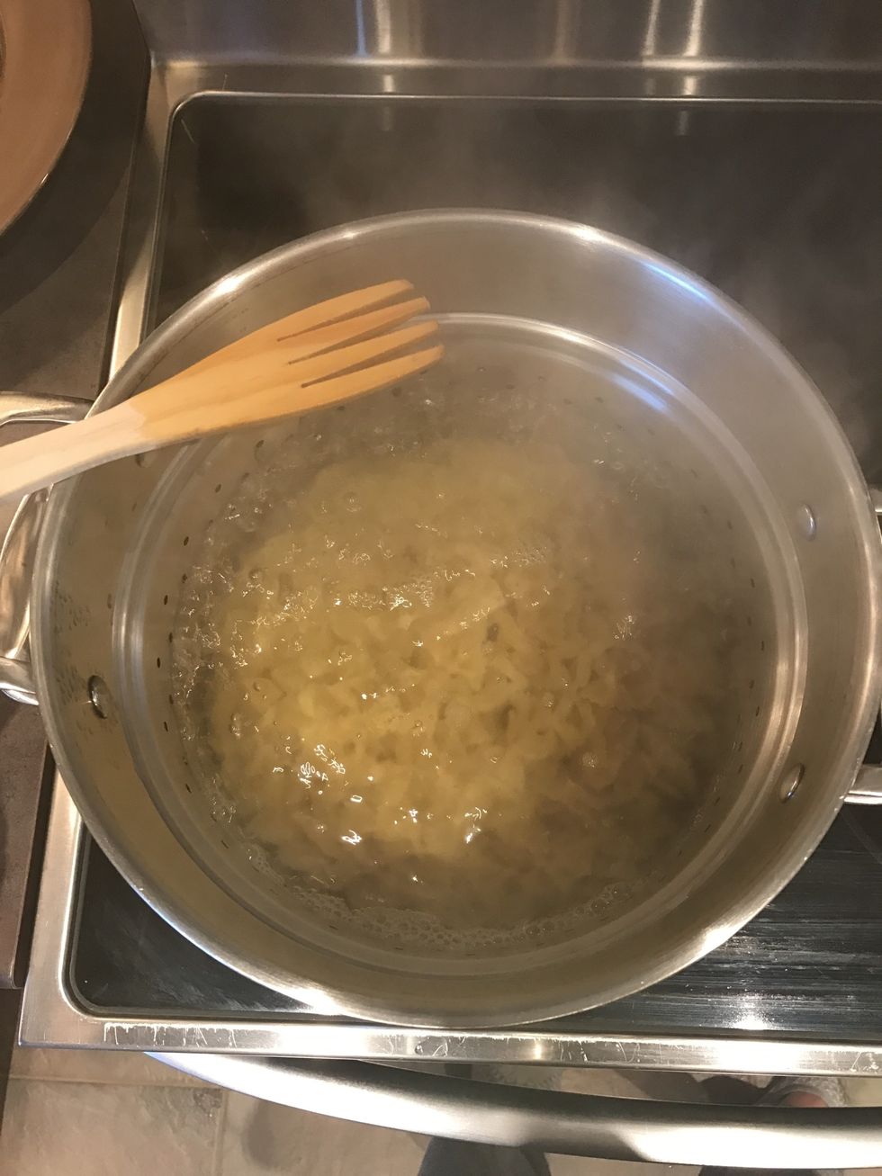 Cook pasta in boiling water